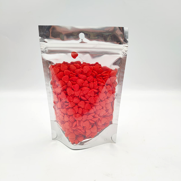 CONFETTI SPRINKLES CORAZON CORAL 75 GR